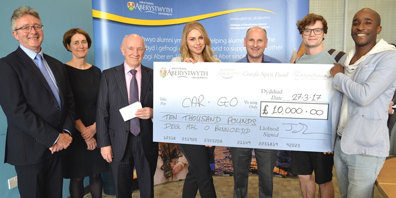 Right to left, Inventerprize winners Pasi William Sachiti and Ariel Ladegaard with Inventerprize organiser Tony Orme, Alana Spencer, Professor Donald Davies, Chair of the Judges, Louise Jagger, Director of Development and Alumni Relations and Professor John Grattan, Acting Vice-Chancellor at Aberystwyth University.