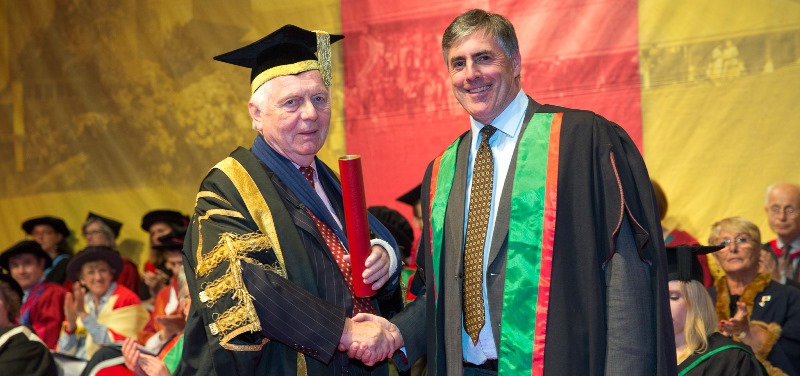 Sir Emyr Jones Parry presenting an Honorary Fellowship to Lance Batchelor, CEO of Saga Plc.