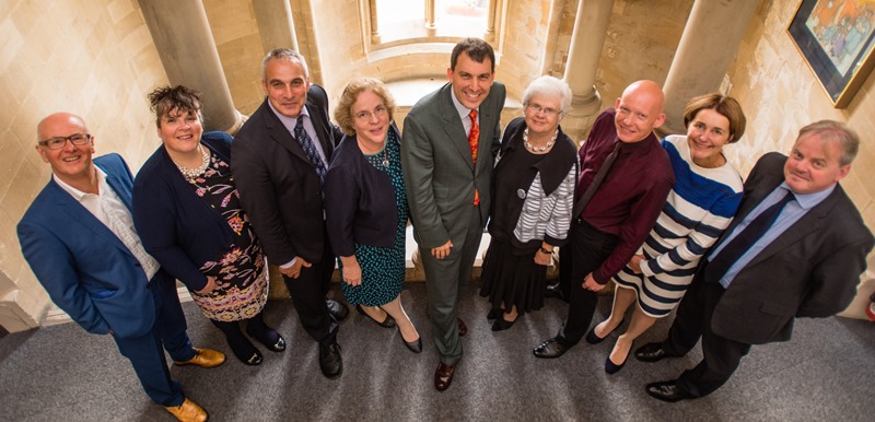 Left to right are Bryn Jones and  Karina Shaw, Penparcau Community Forum; Richard Bellamy, Head of the National Lottery Heritage Fund; Professor Elizabeth Treasure, Vice-Chancellor; John Glen MP, Parliamentary Undersecretary of State for Arts, Heritage and Tourism; Gwerfyl Pierce Jones, Chair of the Old College Project Board; Dr Rhodri Llwyd Morgan, Pro Vice-Chancellor; Louise Jagger, Director of Development and Alumni Relations; and Guto Bebb MP, UK Government in Wales Minister.