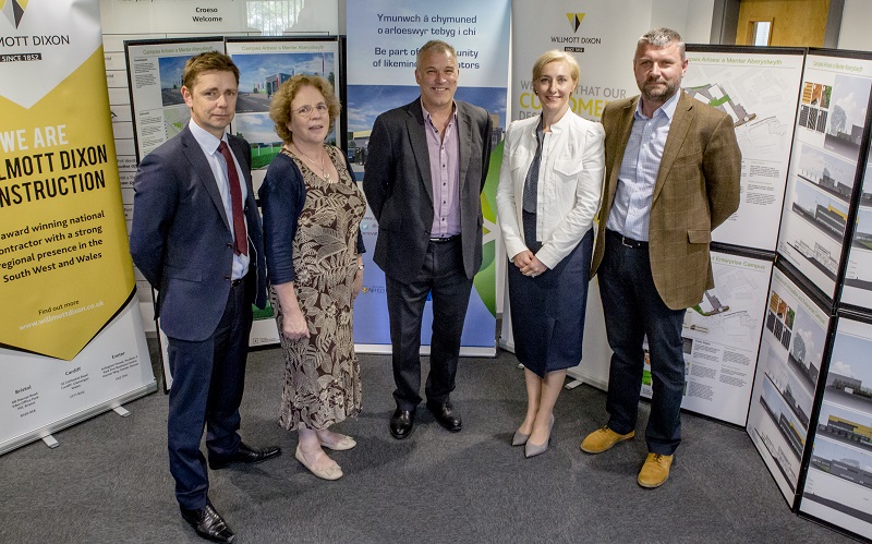 Left to Right: Ian Jones, Director for Wilmott Dixon Wales and West; Professor Elizabeth Treasure, Vice-Chancellor of Aberystwyth University; Professor Chris Thomas, Pro Vice-Chancellor for Research and Innovation at Aberystwyth University; Dr Rhian Hayward, Chief Executive Officer at Aberystwyth Innovation and Enterprise Campus; and Jeff Monks, Head of Estate Operations at BBSRC.
