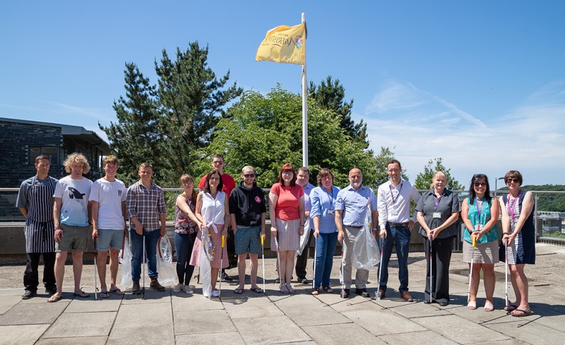 Rebecca Davies Pro Vice-Chancellor and Chief Operating Officer with staff on a campus litter pick as part of Aberystwyth University’s Plastic Free Day.