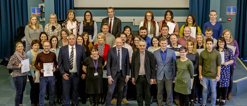 Presenting certificates for the Facilitation for Organisation Leadership and Coaching and Mentoring for Leaders modules which were developed between Aberystwyth University and Menter a Busnes.