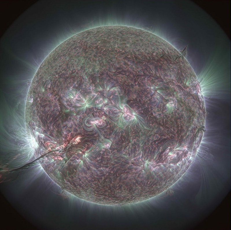 The low solar corona as viewed in extreme ultraviolet light. Bright regions are where the most energetic solar storms are born. An eruption in action can be seen in the bottom-left. NASA’s Solar Dynamic Observatory (SDO) satellite., Author provided