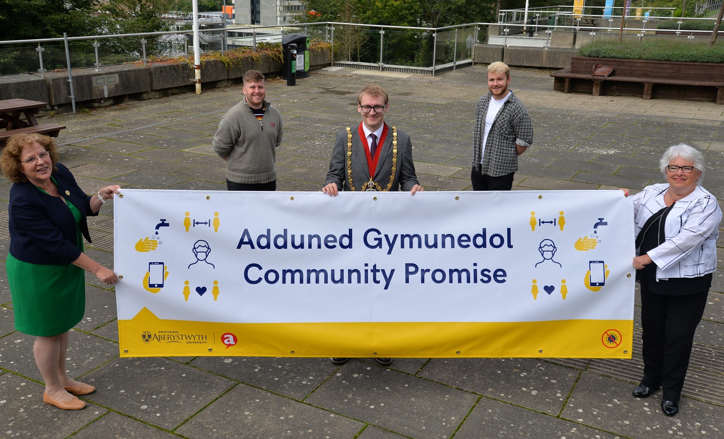 From left to right: Professor Elizabeth Treasure, Vice-Chancellor, Aberystwyth University; Morgan Lewis, President of UMCA; Charlie Kingsbury, Mayor of Aberystwyth; Nate Pidcock, President of Aberystwyth Students Union; and Cllr Ellen ap Gwynn, Leader of Ceredigion County Council