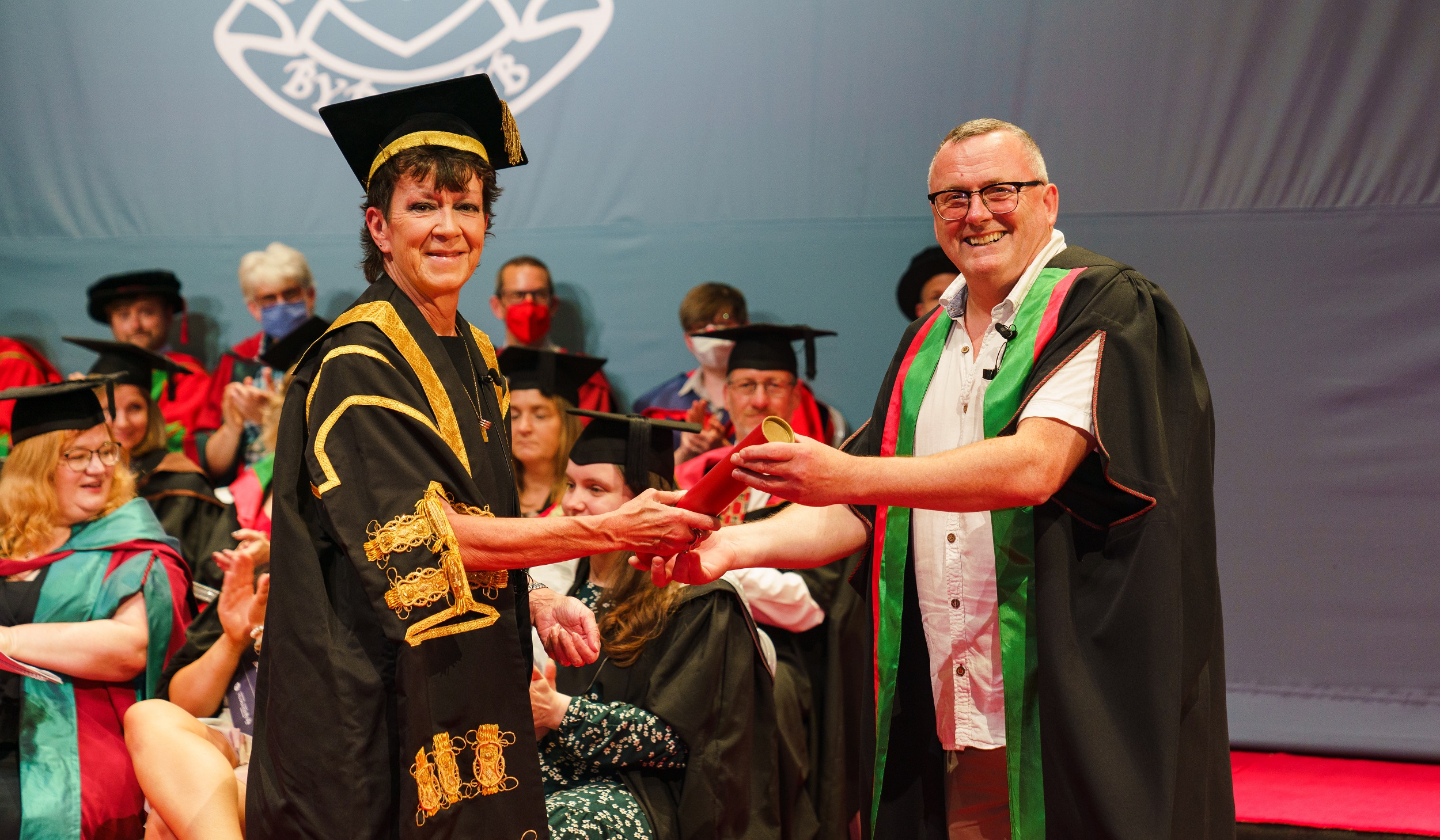 Aberystwyth University Council member Meri Huws with Harry Venning