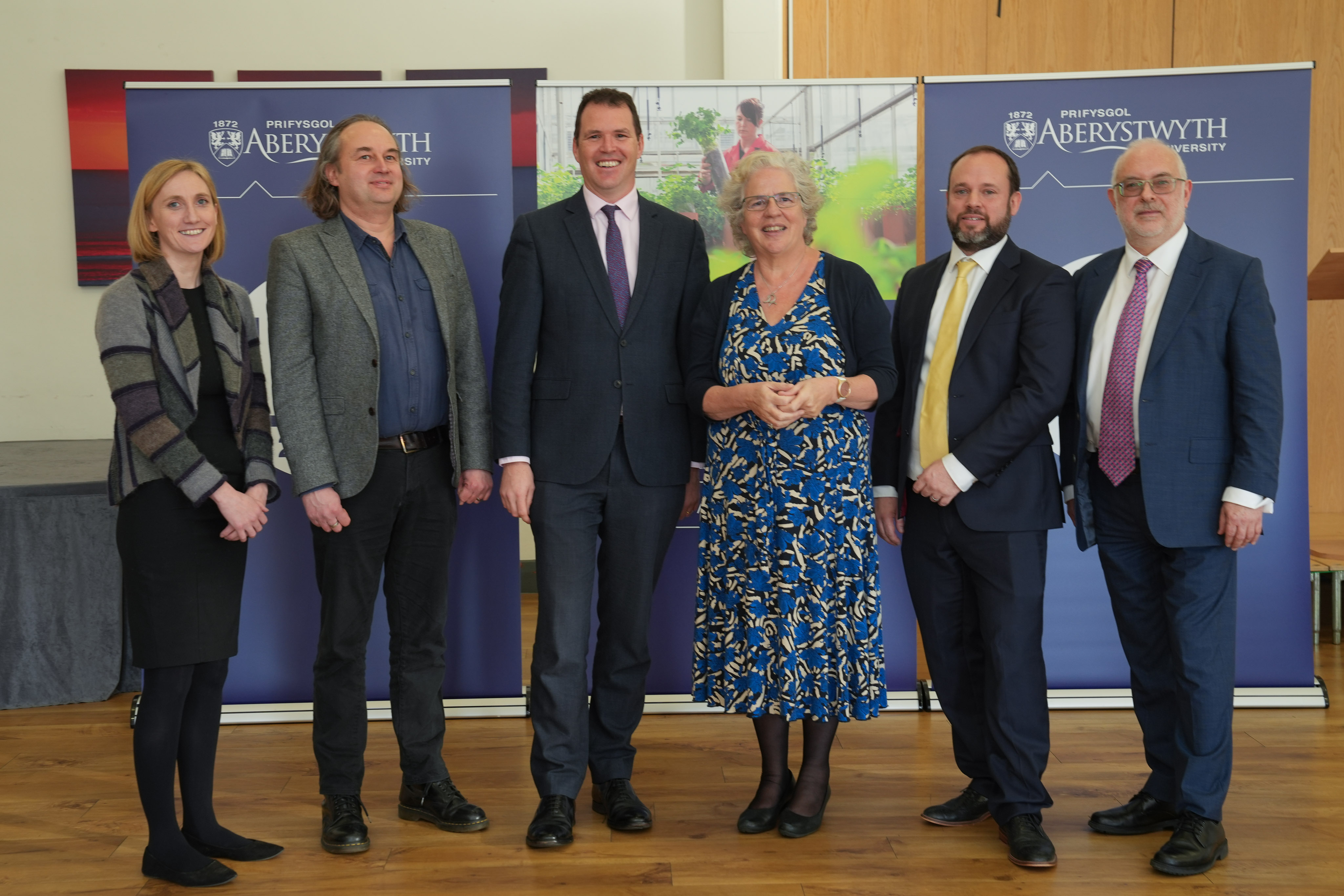 Lee Waters MS, Wales’ Deputy Minister for Climate Change, at the official launch of Aberystwyth University’s Centre for Transport and Mobility with Dr Rachel Rahman, Professor Charles Musselwhite, Vice-Chancellor Professor Elizabeth Treasure, Professor Peter Merriman and Pro Vice-Chancellor Professor Colin McInnes.