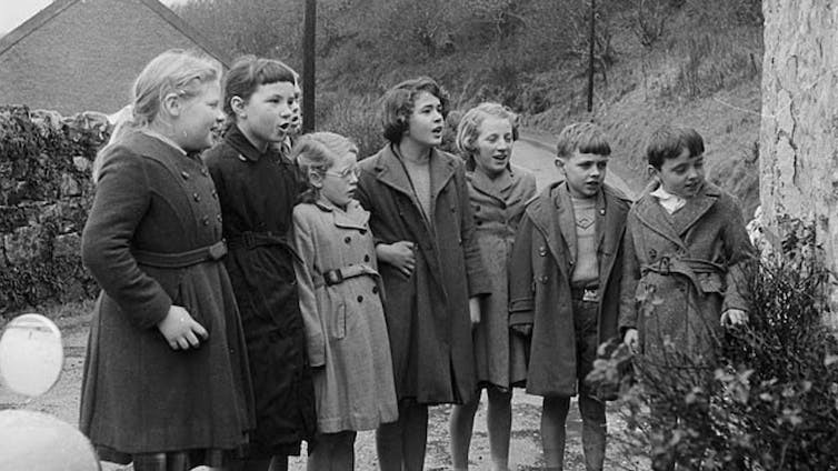 The children of Cwm Gwaun go door to door singing and collecting calennig in 1961. Geoff Charles/National Library of Wales