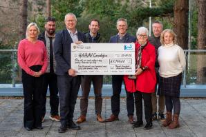 Vice Chancellor, Professor Jon Timmis and University staff presenting a cheque to Gwerfyl Pierce Jones, chair of HAHAV Ceredigion.