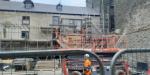 Scaffold removal at the rear of the Georgian villas. 