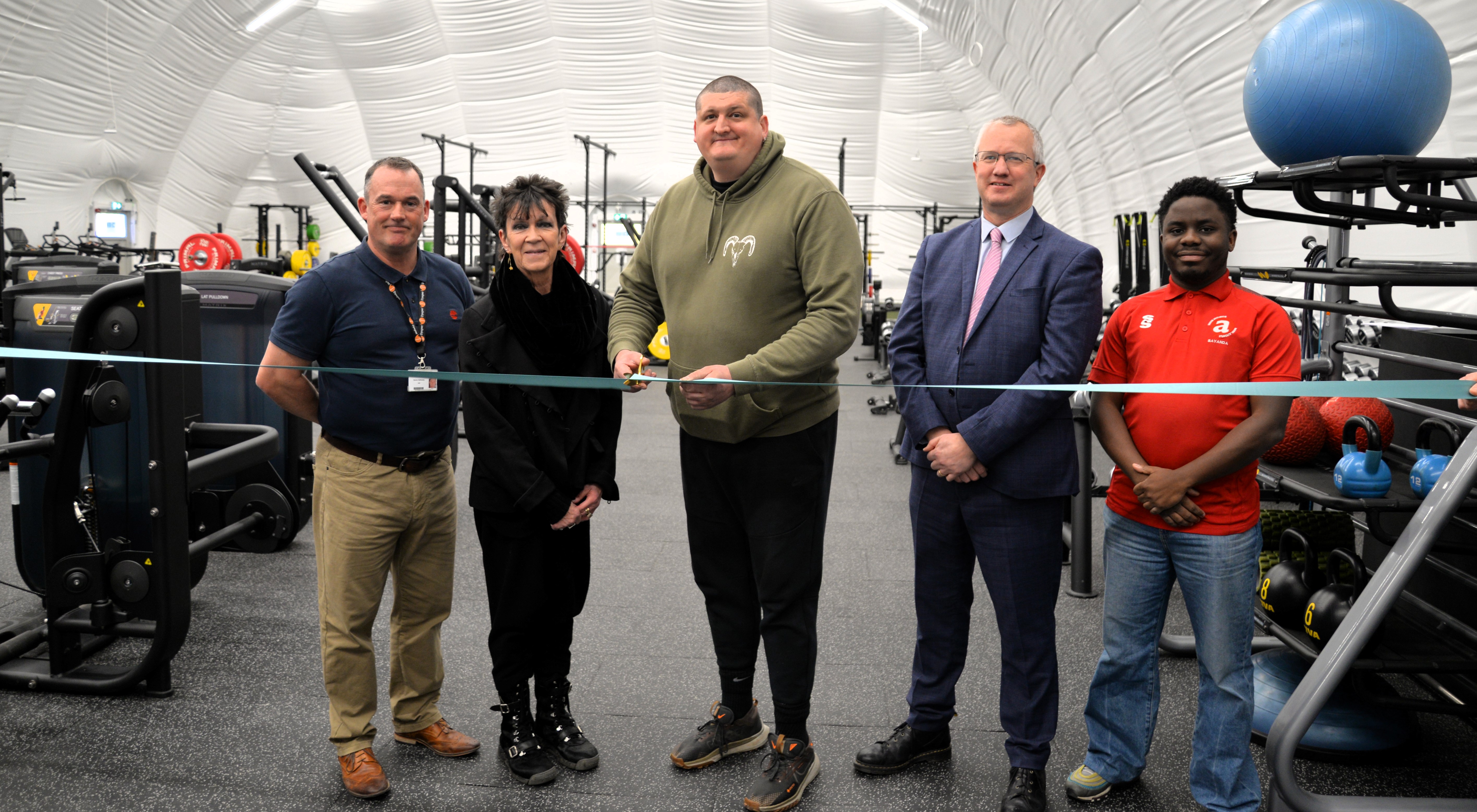 Left to right: Darren Hathaway, Head of Sport and Grounds; Meri Huws, Chair of University Council; Gareth Ward, Ynyshir; Professor Jon Timmis, Vice-Chancellor and Bayanda Vundamina, President of Aberystwyth Students&rsquo; Union at the opening of the new University sports dome and gym.