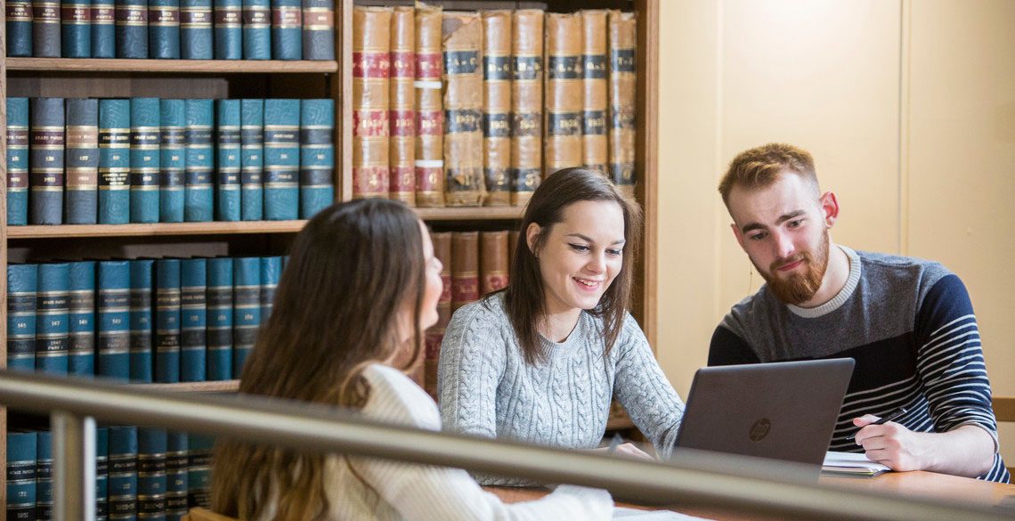Postgraduate students studying in the North Room of National Library.