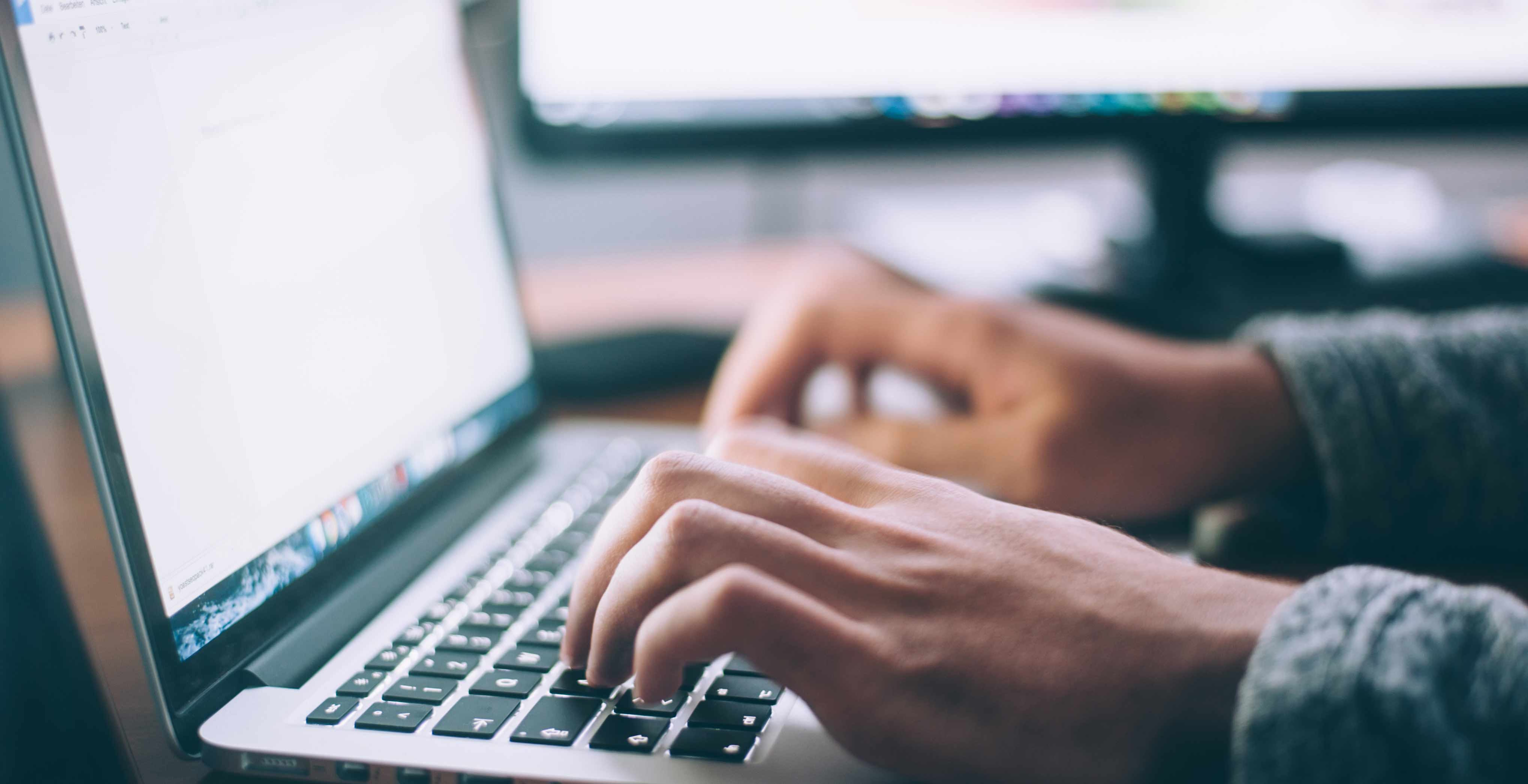 a student using a laptop 