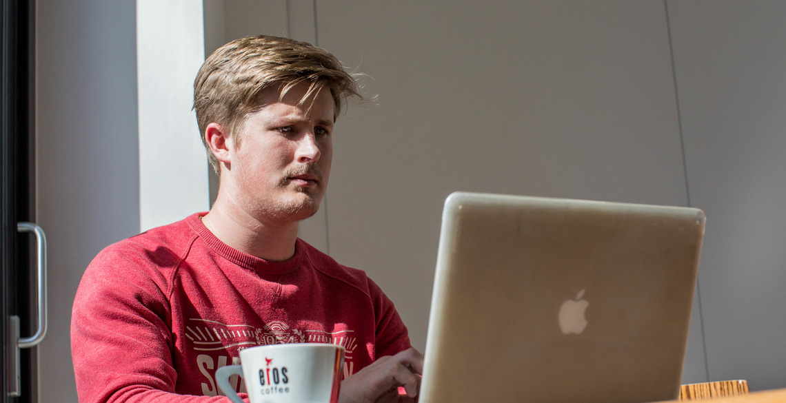 During Your Application; Student working on a laptop