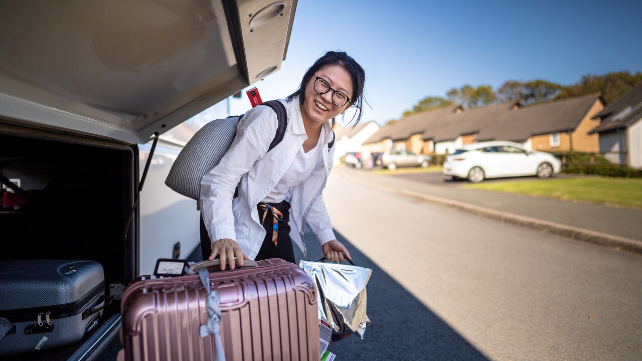 Student arriving on bus