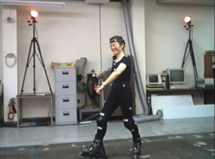 [PhD student Baihua Li with attached
	   markers]